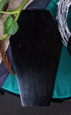 The Haunted Mansion Home & Gifts Mortis Coffin Cutting Board