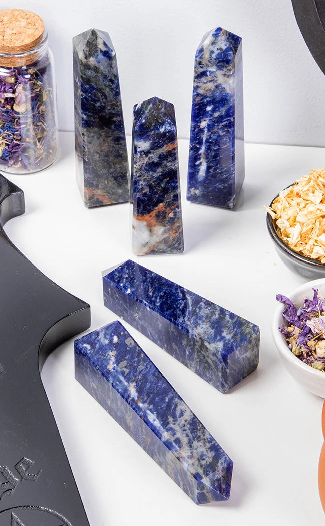 Crystals Witchcraft Polished Point | Sodalite 4 Crystals Witchcraft Polished Point | Sodalite